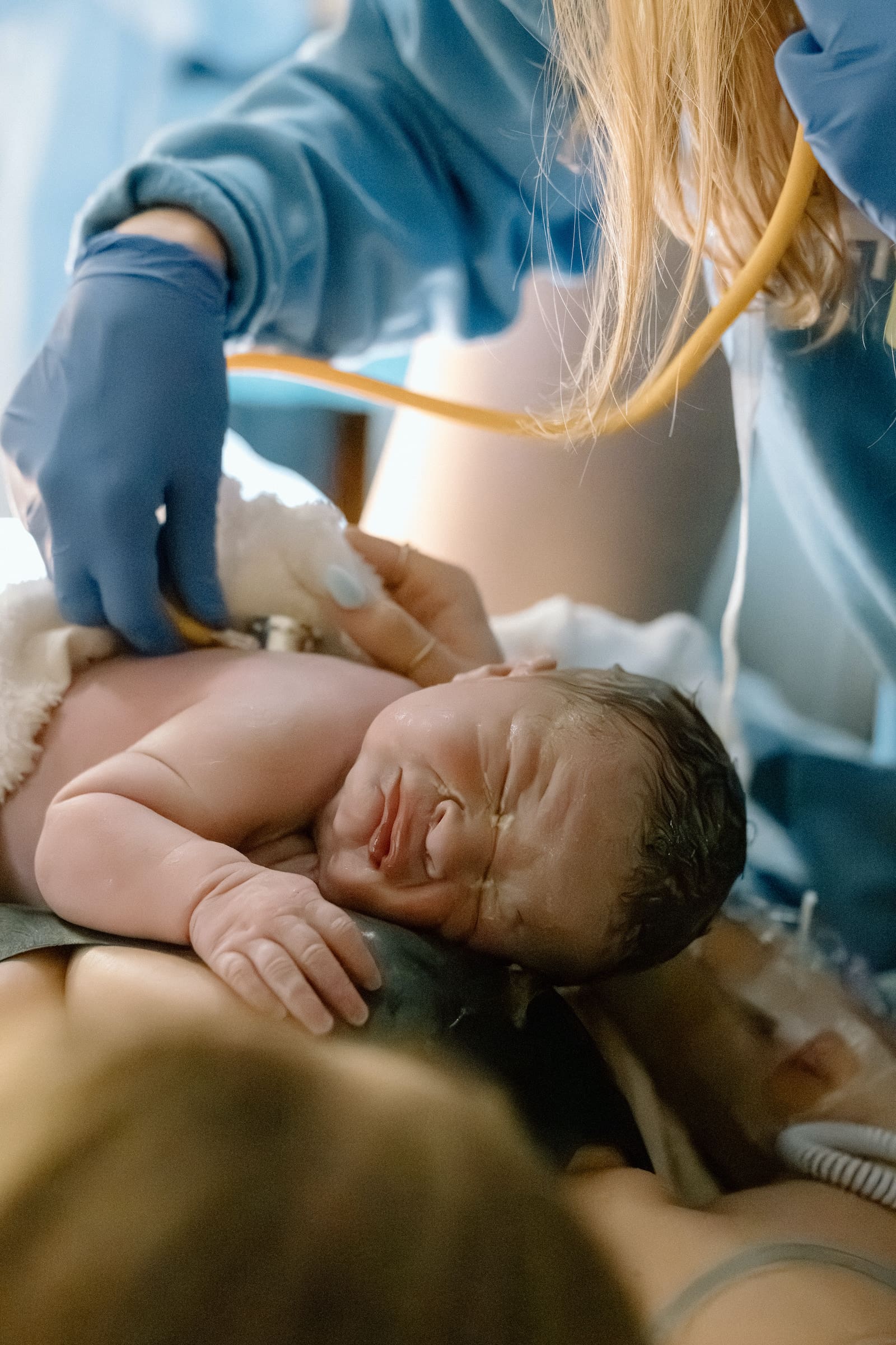 What The Bump CLT doula supporting a mother during labor at Novant Health Presbyterian Medical Center in Charlotte, NC.